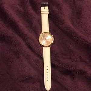 Rose gold/ cream colored watch